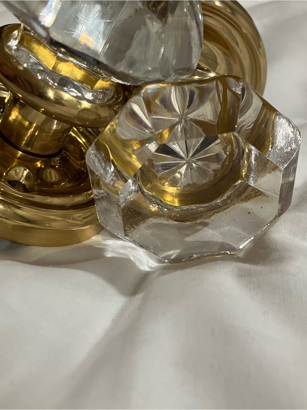 Brass and clear door knobs